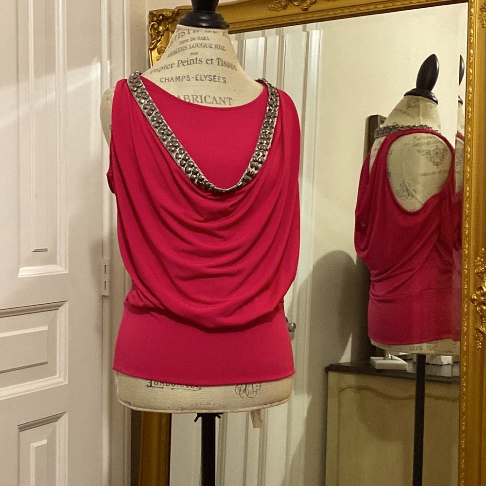 Pink and silver top.